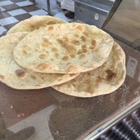 Fresh bread just out of the tandoor ovenn  at Baghdad in London