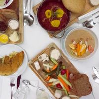 Omelette, different spreads, Shakshuka with polenta, porridge, vegan cheese platter - all delicious!  at Anastasia in Tel Aviv