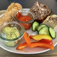 Small hearty breakfast with spelt bun, hazelnut bread, cashew cheese and vegetable spread  at Das Voglhaus in Konstanz
