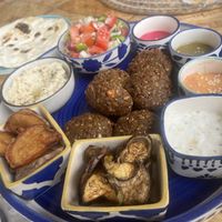 Falafel and hummus plate with dips. Ensure all dips are VEGAN!  at La Manjaare Café in Pushkar