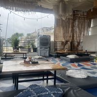 Relaxing roof top seating area  at La Manjaare Café in Pushkar