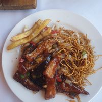 Aubergine in chilli & black bean sauce, noodle, s&p chips at Peking Garden Wilmslow in England