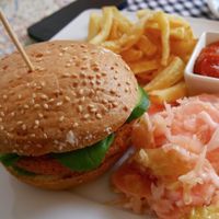 Burger with salad and potato-fries at Flow Food in Bialystok