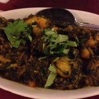 Potato and spinach dish at Purnima Bangladeshi Cuisine in Chamblee