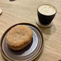 Chocolate lava churro and flat white    at Podda & Wren Coffee Roasters  in England