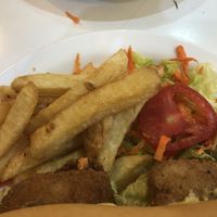 Fries and fresh salad   at Konu Bar in Buenos Aires