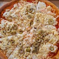 Mozarella Pizza (I wish it would have said "olives" on the menue because I would have gladly have them leave them off;). at Konu Bar in Buenos Aires