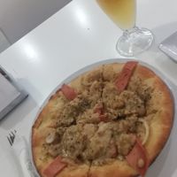 Small Pizza with ham and onion at Konu Bar in Buenos Aires