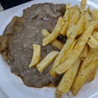 Matambre con salsa de champiñones. We didn't like it. at Konu Bar in Buenos Aires