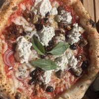 Pizza with added vegan burrata   at Fatto a Mano Covent Garden in London