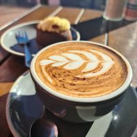 Almond milk coffee in the sun at Dad and Dave's Cafe in Yarraville