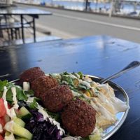Falafel plate with salad, hummus and tahini sauce at Falafel Fabrik - Seeburg in Kiel