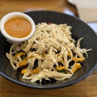 Rice bowl with sauce on the side  at P.S. and Co. in Philadelphia