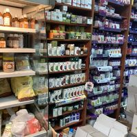 Tiny fridge with a bit of vegan cheese and tofu and lots of vitamins  at Teva Col in Ramat Gan