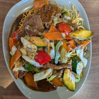 Crispy noodles with beef and black bean sauce at Lotus Plant Based Kitchen in Manchester