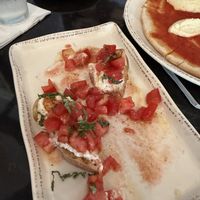 Tomato bruschetta had amazing tomato   at The Local in Naples