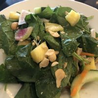 Spinach Salad with ginger vinaigrette dressing. Really good! at The Local in Naples
