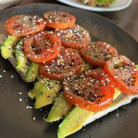 Avocada and grilled tomato toast  at June's Art Cafe in Koh Samui