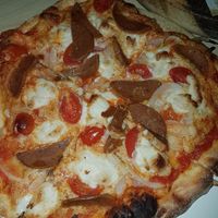 Pizza with vegan sausage at Hatool HaYarok - The Green Cat in Tel Aviv