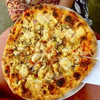 Large pizza  at Hatool HaYarok - The Green Cat in Tel Aviv