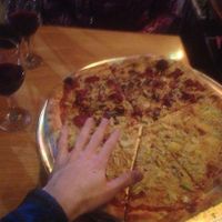 huge family pizza ajew at Hatool HaYarok - The Green Cat in Tel Aviv