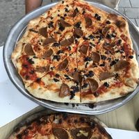 Peperoni with olives  at Hatool HaYarok - The Green Cat in Tel Aviv