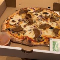 Mushroom, red onion, pepperoni and mozzarella personal pizza!  at Hatool HaYarok - The Green Cat in Tel Aviv