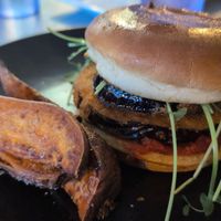 Eggplant burger with tomato jam and a side of sweet potatoes at Kool Beanz Cafe in Tallahassee