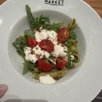 Penne pasta with pesto and burrata  at Fava Tonka — Time Out Market Porto in Porto