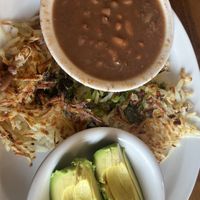 Hash browns with peppers and onions, beans, and avocadoo  at Boogies Restaurant in Del Norte
