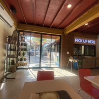 Inside seating very clean and nice - Indian tunes playing  at Accha Indian Dhaba in Chiang Mai