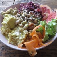 Love Bowl, gluten-free (red cabbage and hazelnut salad, pink grapefruit, lettuce, shaved carrots, millet, chickpea hummus, and white beans sprinkled with black sesame seeds) at Moehren Milieu Eco Cafe in Mainz