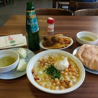 Massabahs with chickpeas on top and like 2 tbsp of regular hummus.  at Abu Hassan - Jaffa in Tel Aviv
