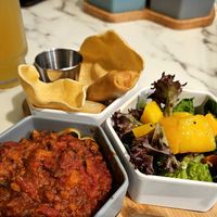 Combo meal with pasta Bolognese, green salad with mango, and spring rolls at OVOCafe - Wan Chai Rd in Hong Kong Island