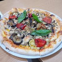 Pizza with vegan cheese and various veg toppings at La Piccola Cucina Italiana Pizza E Pasta in Coimbra