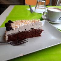 Vegan cake and Cappuccino at Alhambra Cafe in Milan
