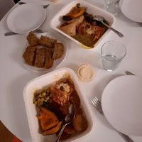 Lasagne, squash, falafel & samosas at Alhambra Cafe in Milan