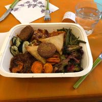 Sam is a, vegn lasagna, and lots of good stuff at Alhambra Cafe in Milan