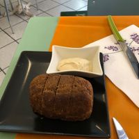 Complimentary bread and himmus at Alhambra Cafe in Milan