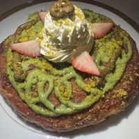 Pistachio and strawberry laminated cinnamon roll   at Délice de Bernay in New York City