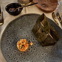 Entree with an Indonesian mais ‘polenta’ and spiced oystermushrooms steamed in banana leaves, served with home made sambal  at Waber. in Overijssel