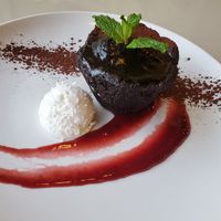 Moist Chocolate Cake

raspberry coulis / coconut milk whipped cream at Bravo in Jackson