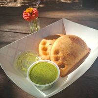 Vegan plantain and black bean empanadas with cilantro sauce at A Taste of Mi Kasa in Chico