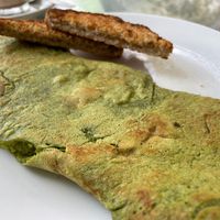 The spinach and mushroom omelette and dry toast.  at Pumpernicle German Bakery in Rishikesh