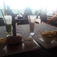 Burger and a Perfect view at Pumpernicle German Bakery in Rishikesh