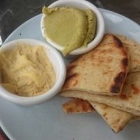 flatbread with hummus and pea dip  at The Real Greek - Bankside in South East London
