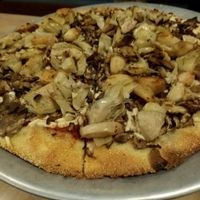 artichoke, mushroom and garlic on vegan crust with daiya at Blue Line Pizza in San Carlos