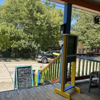 Very cute patio with games, staff was extremely friendly. Very relaxed atmosphere   at Harold's Diner Soda Fountain & Farmacy in Eureka Springs