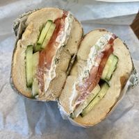 Tofu scallion cream cheese, tomato, and cucumber on a plain bagel  at Bagel Pub - University Place in New York