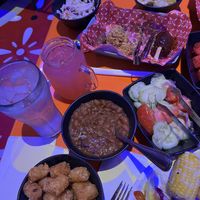 Beans, slaw, corn, cauliflower, and vegan sausage   at Roundup Rodeo BBQ in Lake Buena Vista
